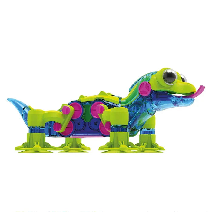 Green and translucent blue robotic gecko with suction cup feet, internal pink gears, and a pink tongue.