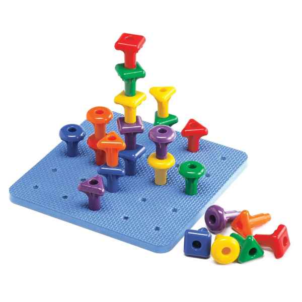 Brightly colored square, triangle, and round pegs stacked on a blue pegboard, with extra pieces lying nearby.