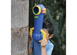 Child peeks around a tree trunk using a tall blue periscope with yellow handles and viewing lens.