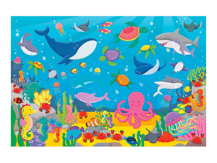 Vibrant cartoon undersea illustration with a blue whale, pink octopus, and colorful sea creatures in a blue ocean.