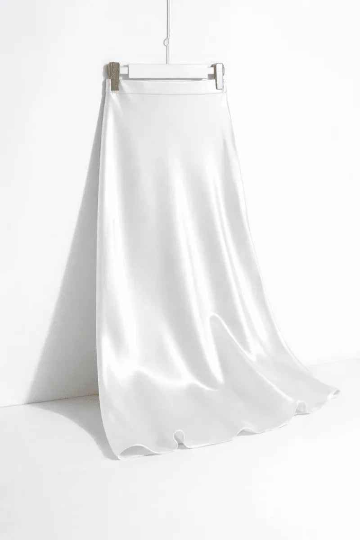 Black satin straight skirt by Stylish 3Sixty5, featuring a sleek, fitted design perfect for elegant and casual wear.