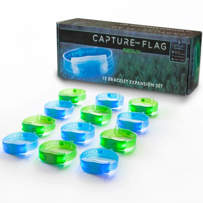 Twelve glowing blue and green LED wristbands displayed in rows in front of a black and blue expansion set box.