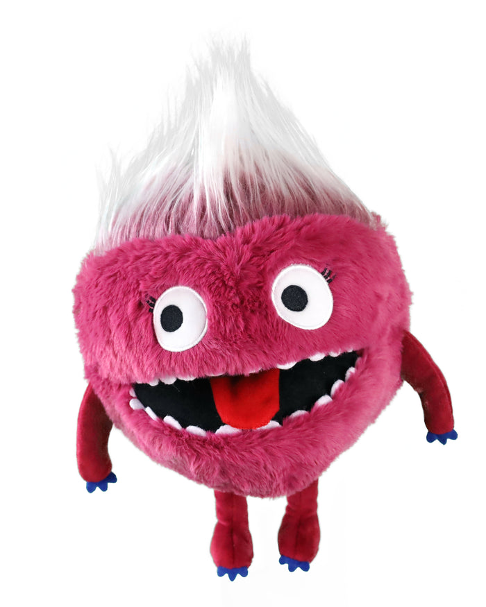 Round fuzzy pink monster puppet with white spiky hair, googly eyes, wide mouth with red tongue, and blue-clawed limbs.