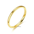 Gold plated stainless steel ring with a glossy mirror finish, 2mm wide plain band from Glitters, perfect for everyday wear.