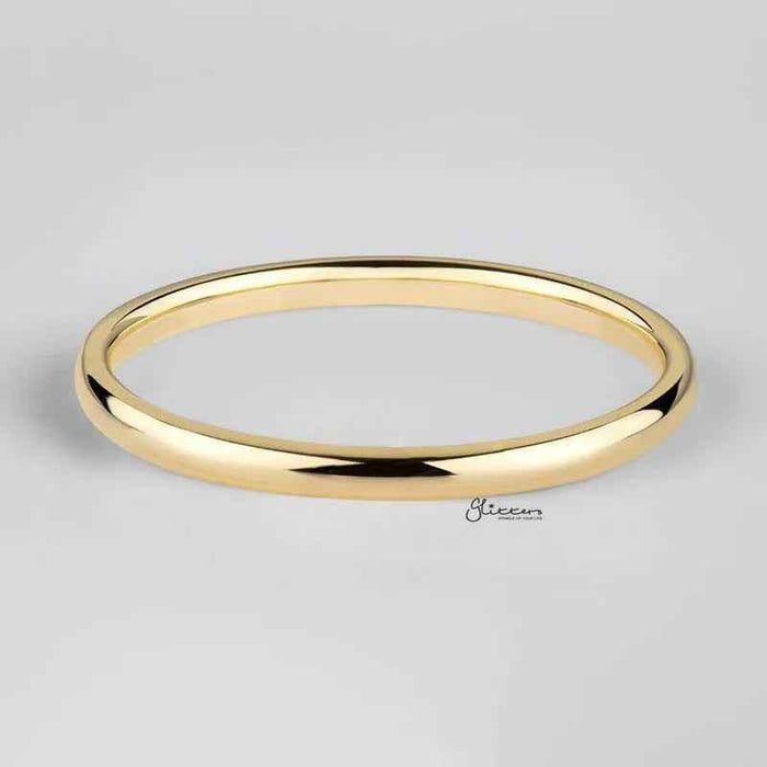 Gold plated stainless steel band ring with a 2mm wide glossy mirror polish, from Glitters stainless steel rings collection.