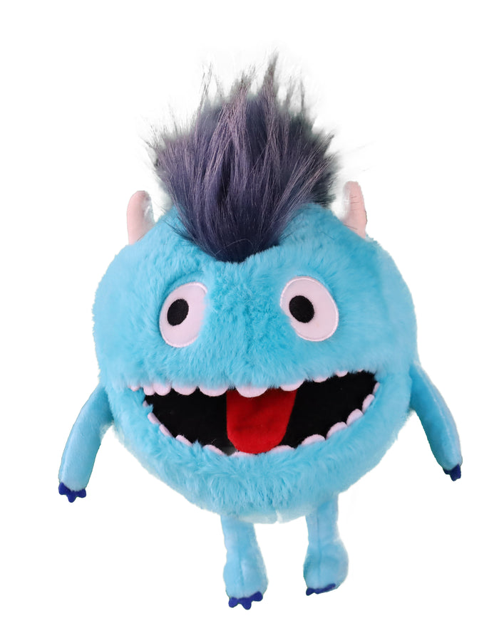 Round blue furry monster puppet with a purple mohawk, wide open mouth, red tongue, and large white eyes.