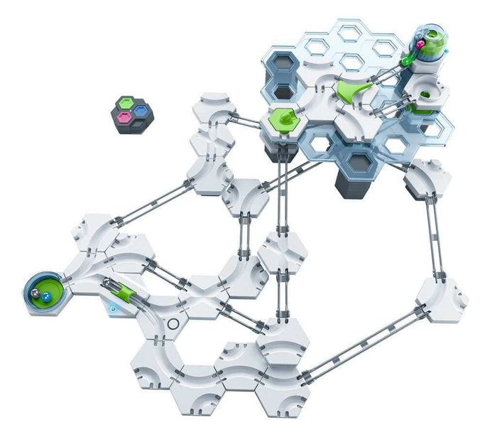 White and green marble run with hexagonal tiles, metal rails, and multi-level translucent blue platforms.