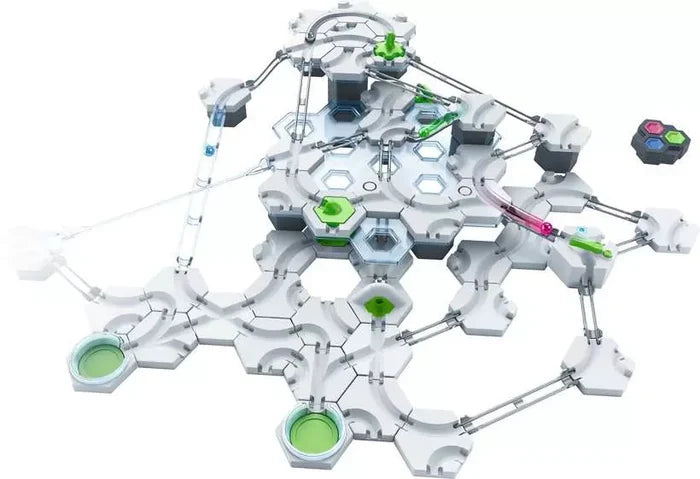 White hexagonal marble run with clear tracks, green mechanical switches, and colored marbles on a white background.
