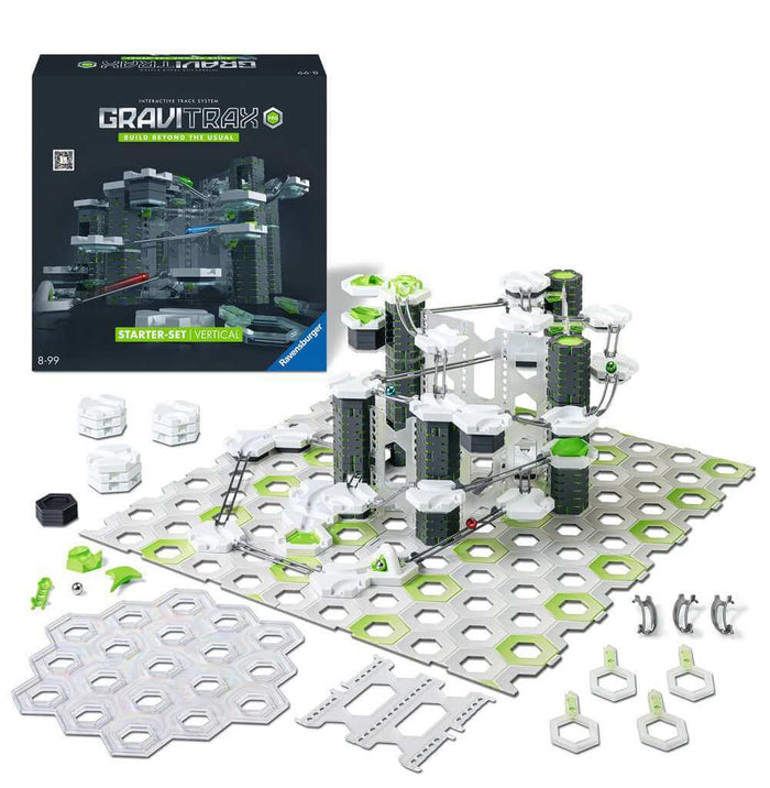 Black box and white, green, and grey marble run with vertical pillars, silver tracks, and loose building pieces.