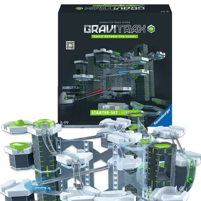 Black box behind a tall marble run with grey pillars, white tiles, lime green accents, and transparent blue tracks.