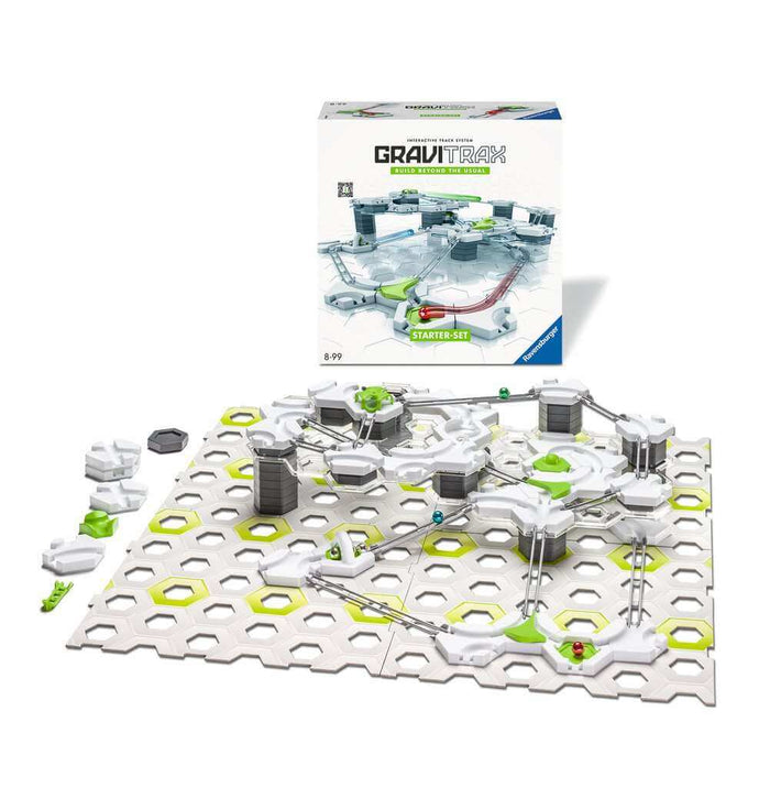 White and gray marble run with green accents on hexagonal baseplates, shown assembled below its product box.