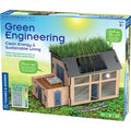STEM experiment kit box featuring a model house with a living grass roof and solar panels in a sunny field.