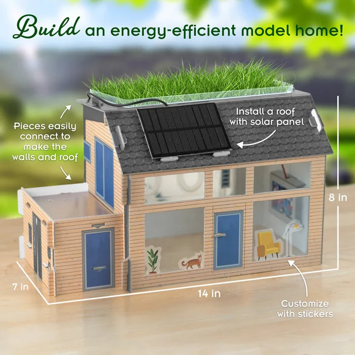 Model house with wood siding, solar panel, grass roof, and blue windows. Labeled 14 inches wide and 8 inches tall.