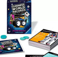Blue card game box with monster truck art, a deck of cards, and small teal tokens on a white background.