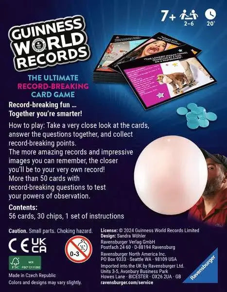 Dark blue game packaging for Guinness World Records featuring cards, blue chips, and a large pink sphere.