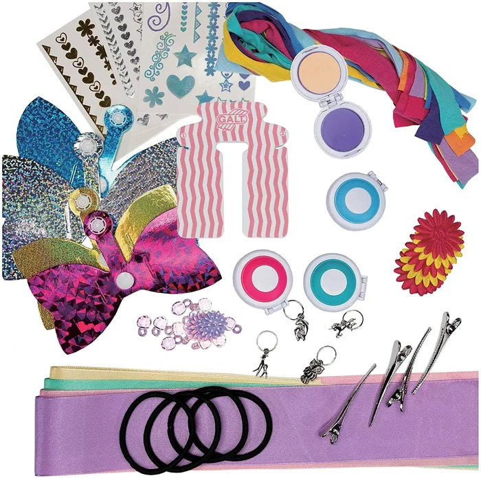 Colorful hair design kit with hair chalk palettes, butterfly bows, ribbons, clips, beads, and glitter stickers.