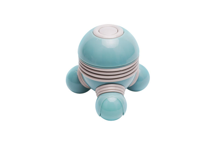 Teal and grey handheld massager with a dome-shaped body, three spherical feet, and a top power button.