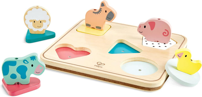Hape wooden puzzle with five farm animal figures on colorful shaped bases that fit into slots on a wood board.