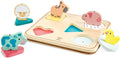 Hape wooden puzzle with five farm animal figures on colorful shaped bases that fit into slots on a wood board.