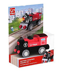 Red and black toy train engine with number 1, displayed in its retail packaging with a city-themed background.
