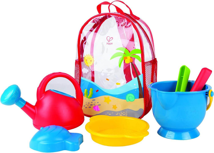 Red watering can, blue bucket with spades, yellow sifter, fish mold, and red-trimmed clear backpack with beach graphics.