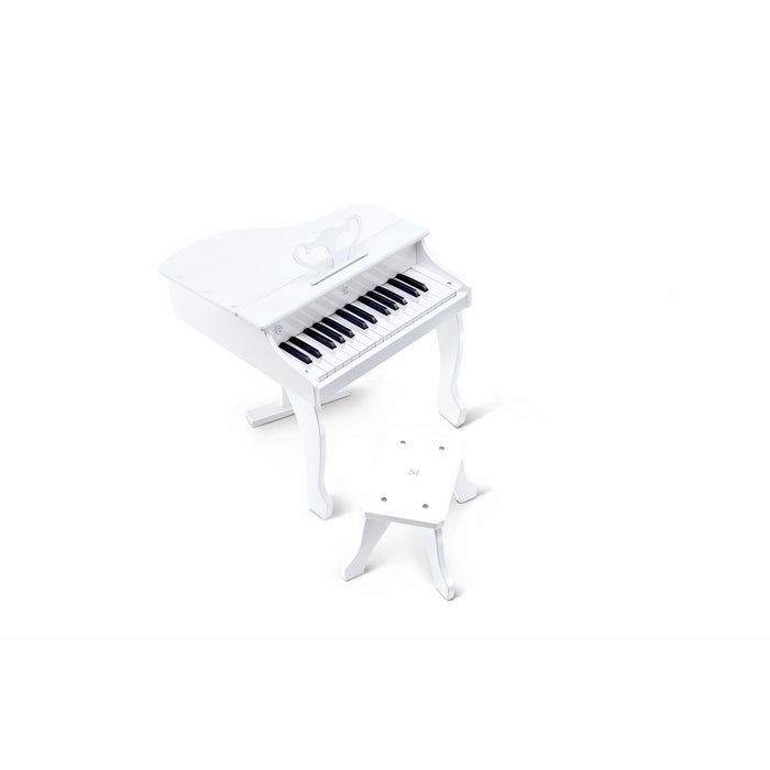 Miniature white grand piano with matching stool, music stand, and black and white keys.