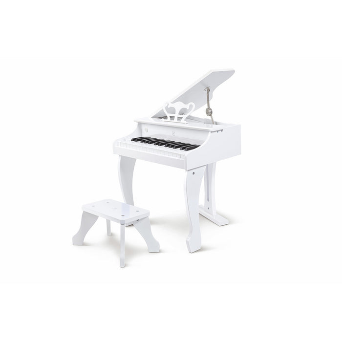 White wooden toy grand piano with propped lid, matching stool, music stand, and black and white keys.