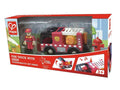 Red toy fire truck and firefighter figurine in Hape box showing siren sound and light features for ages 3+.