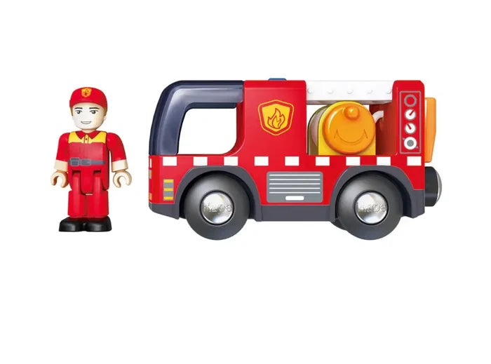 Red toy fire truck with blue windshield and yellow hose reel next to a matching firefighter figure.