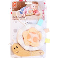 Wooden snail toy with a striped plush shell, colorful fabric tags, and hanging loop on Hape retail packaging.