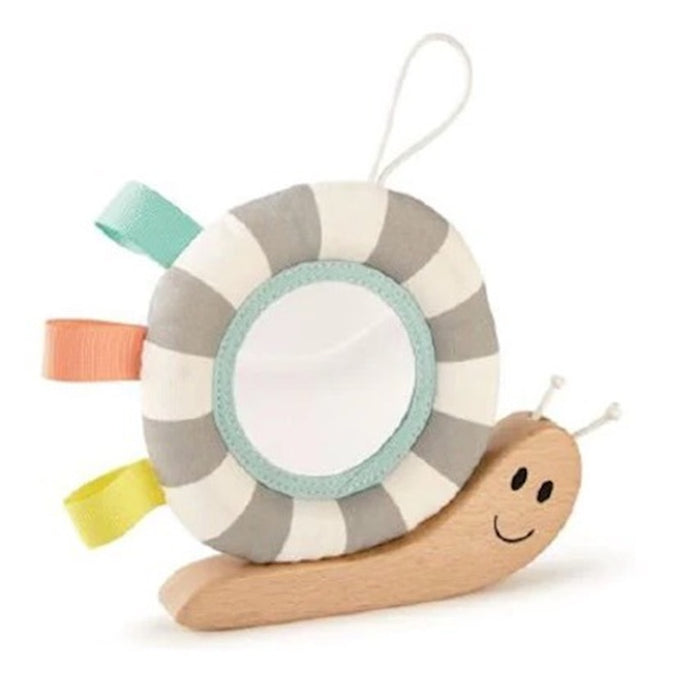 Wooden snail toy with a smiling face and a grey and white striped plush shell featuring a mirror and colorful tags.