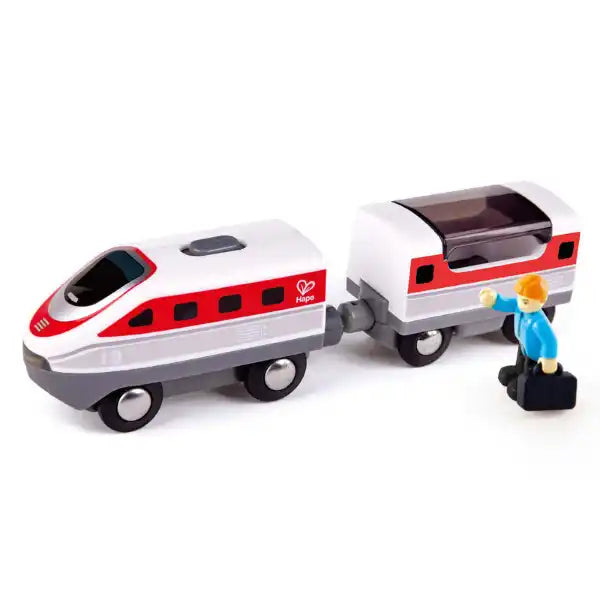 Sleek white and red toy train with two cars and a small figure waving with a briefcase on a plain white background.