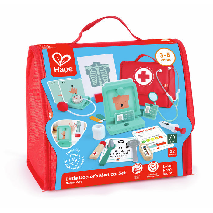Red Hape medical kit bag showing toy stethoscope, syringe, and wooden medical tools for children aged 3 to 8.