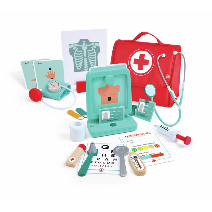 Toy medical set featuring a red bag with a cross, mint green stethoscope, X-ray viewer, syringe, and wooden accessories.