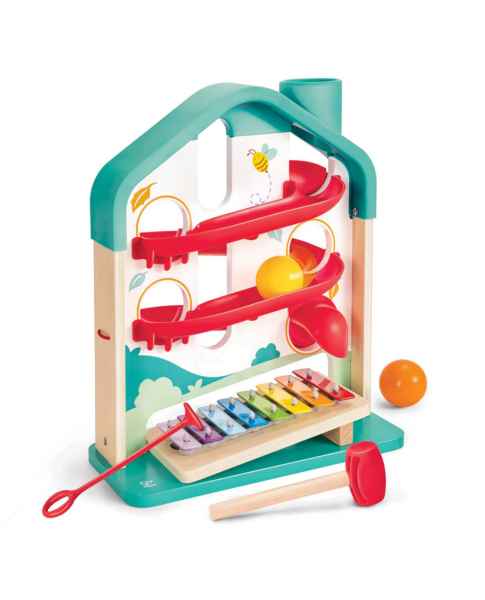 House-shaped wooden ball run with red tracks, a rainbow xylophone, yellow and orange balls, and red strikers.