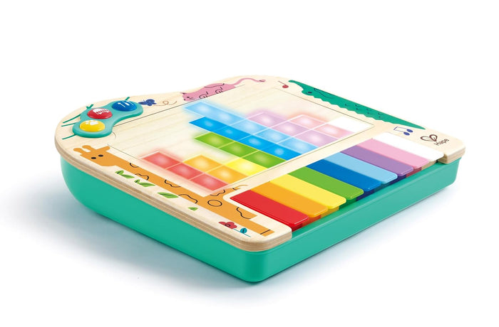 Wooden electronic piano toy with rainbow keys and a light-up screen displaying colorful pixel blocks.