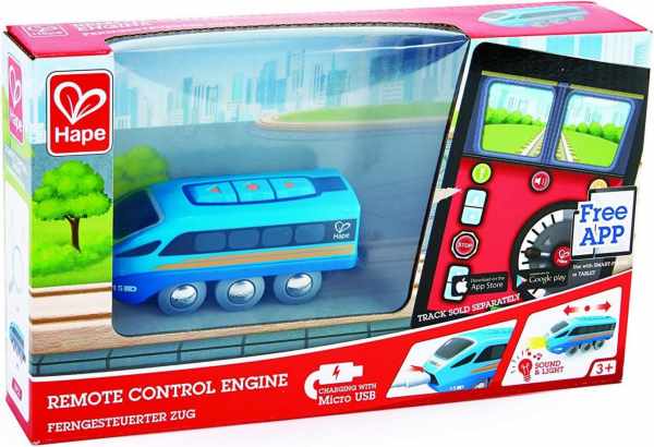 Blue toy train engine in red and white packaging with a clear window, app interface graphics, and charging icons.
