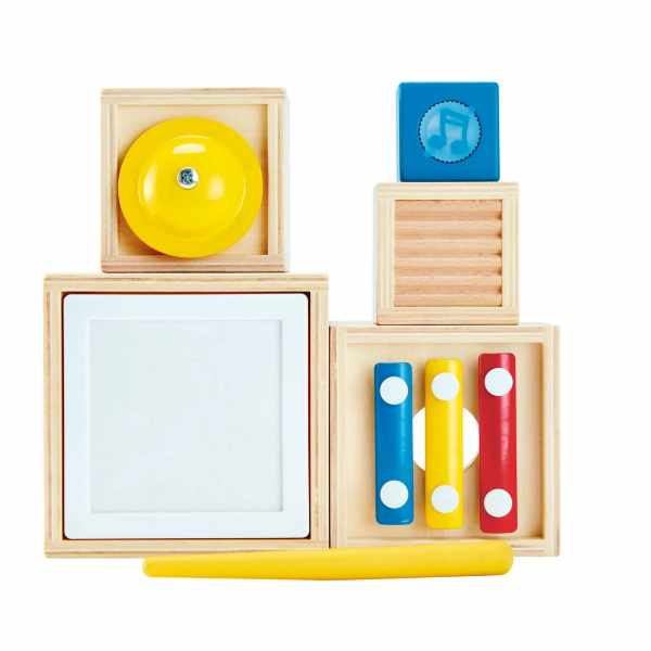 Stacked wooden musical blocks featuring a white drum, yellow cymbal, colorful xylophone, and a yellow mallet.