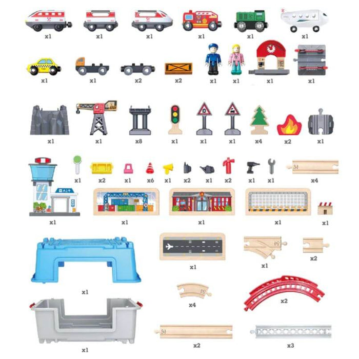 Organized layout of colorful wooden toy set pieces: trains, cars, plane, figures, tracks, and a blue bridge.