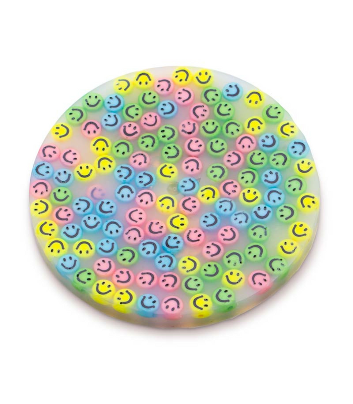 Round translucent disc filled with small, colorful smiley face beads in pink, blue, yellow, and green.