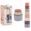 8 muted earth-toned stacking cups shown in a tall tower, nested together, and in their original packaging box.