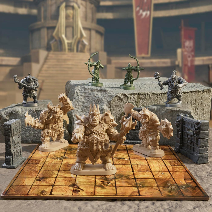 Tan ogre miniatures, grey orcs, and green archers on a grid game board with stone scenery in a fantasy arena.