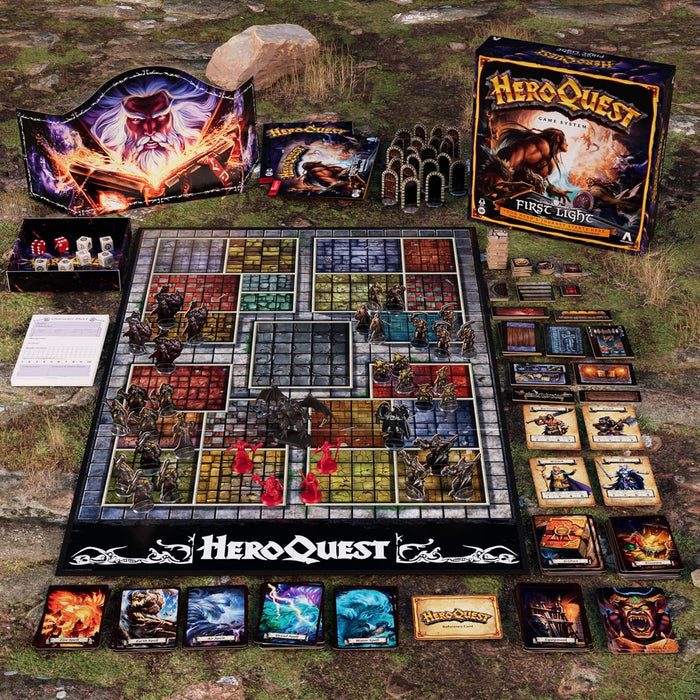 HeroQuest First Light board game featuring a gridded map, plastic miniatures, cards, and dice on a stony background.