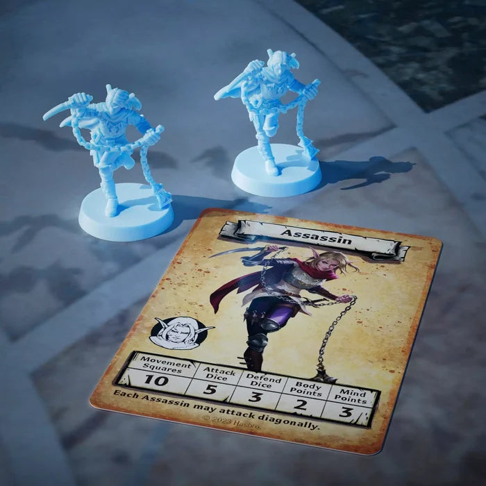 Two light blue plastic assassin miniatures next to a character card showing game stats and elf artwork.