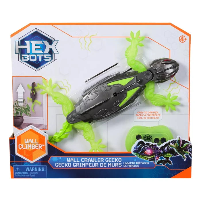 Robotic gecko with lime green limbs and gray armor in orange packaging with a remote and wall-climbing graphic.