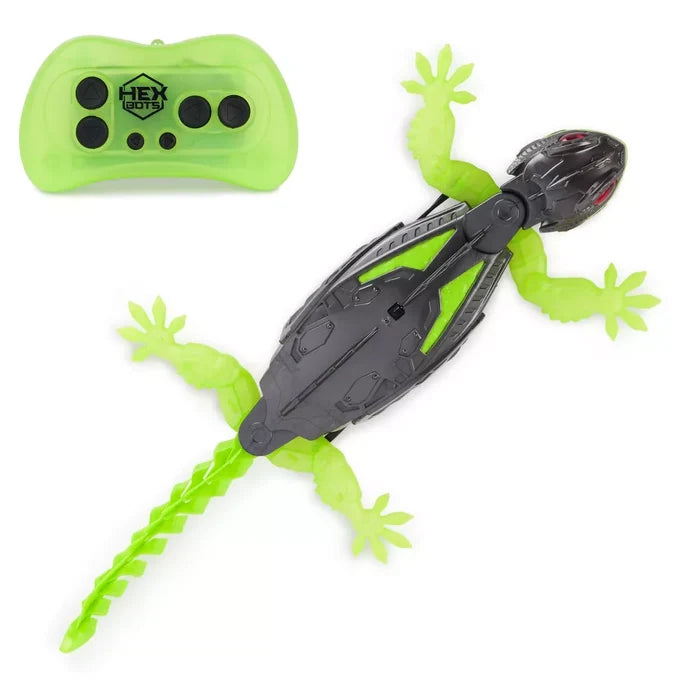 Neon green and grey remote-controlled robotic gecko lizard toy with red eyes and a matching neon green remote.