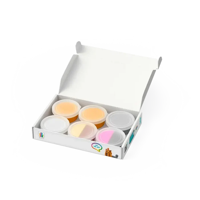 Six small cans of colorful modeling clay in an open white box, including orange, white, pink, and gray shades.