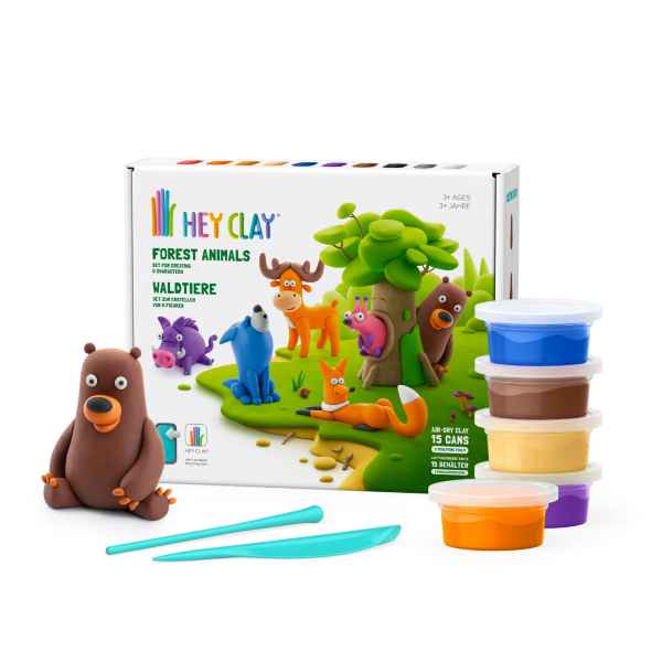 White box with forest animal clay art, a molded bear figure, 5 colorful clay tubs, and teal sculpting tools.