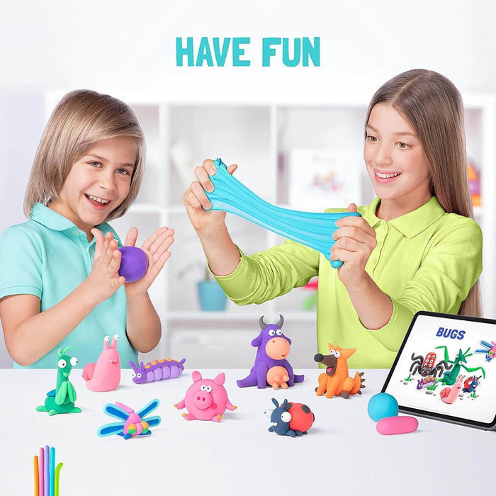 Two children molding and stretching colorful clay to create animal figures like a pig, fox, and ladybug on a table.