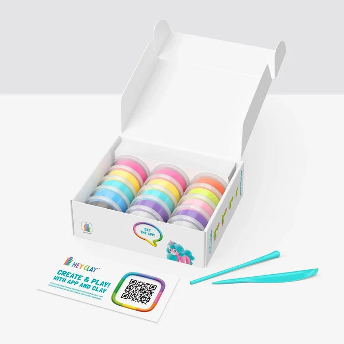 15 colorful clay tubs in an open white box with two turquoise sculpting tools and a QR code instruction card.